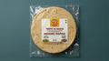 Homemade Moong Daal papad sealed in transparent pouch packing ready to fry